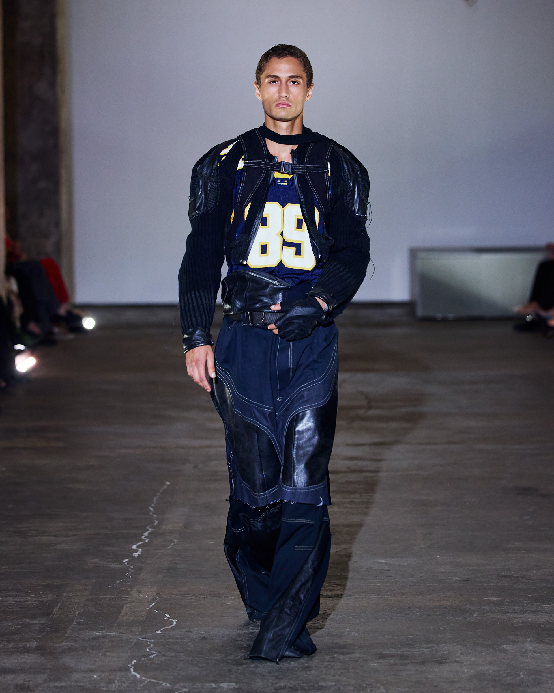 Deconstructed racing jacket with double-layered trousers