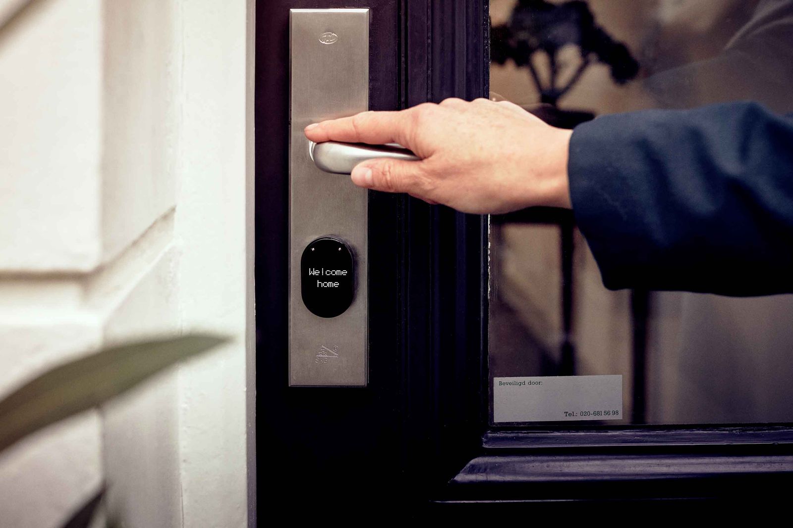 A keypad smart lock fitted to a home's entry door