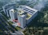 Luftaufnahme eines modernen Bürokomplexes mit hohen Gebäuden und einem Solardach, umgeben von Bäumen und Straßen.