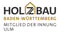 Logo "HOLZBAU BADEN-WÜRTTEMBERG" mit stilisiertem Dach über "Z". Darunter "MITGLIED DER INNUNG ULM".