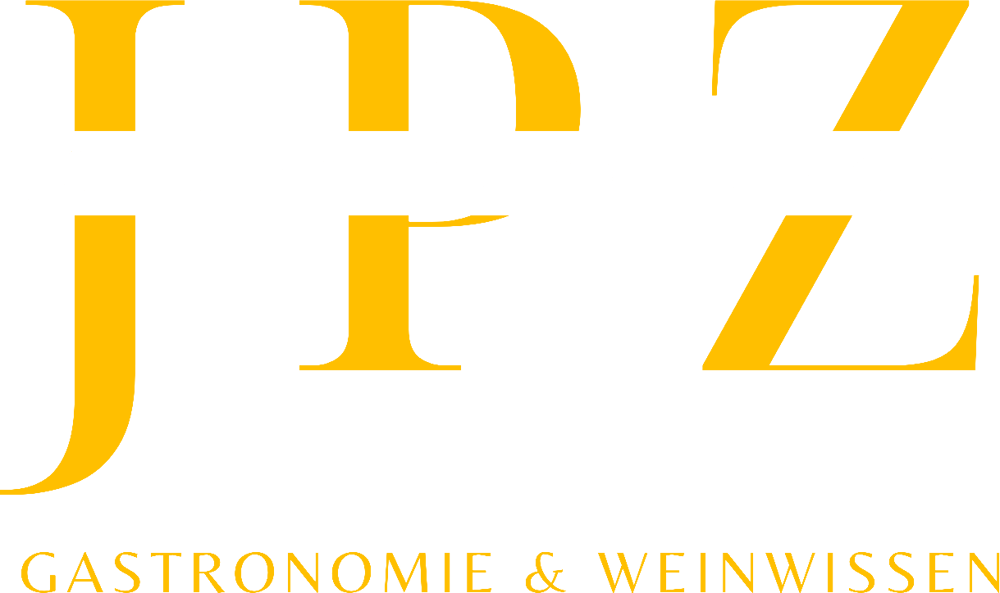 Logo "JPZ JÜRG PETER ZOLLINGER GASTRONOMIE & WEINWISSEN" in Gold auf dunkelgrünem Hintergrund.