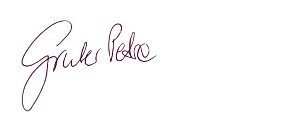 Unterschrift in dunkelroter Tinte mit den Worten "Grüße Pedro".