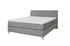 Graues Boxspringbett Avalon mit hohem Kopfteil und weißer Matratze.