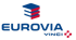 Eurovia Vinci-Logo, ein blauer und roter Kubus über dem blauen Schriftzug "EUROVIA" und "VINCI" mit rotem Pluszeichen.