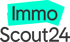 ImmoScout24 Logo: "Immo" in Türkis auf unregelmäßigem Hintergrund, darunter "Scout24" in Grau.