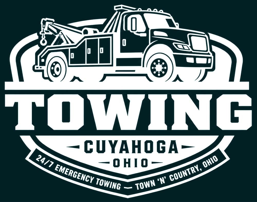 White graphic of a tow truck above "TOWING CUYAHOGA OHIO 24/7 EMERGENCY TOWING TOWN 'N' COUNTRY, OHIO".