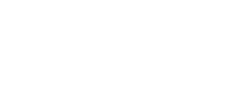 Weißer Land Rover Defender auf grünem Hintergrund mit den Worten „DEFENDER GARAGE“.