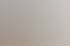 Eine große Gruppe von Menschen posiert für ein Foto im Treppenhaus eines modernen Bürogebäudes.