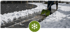 Schneeräumung eines Gehwegs mit Schneeschieber