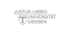 Logo der Justus-Liebig-Universität Gießen mit Wappen und stilisiertem „T“.