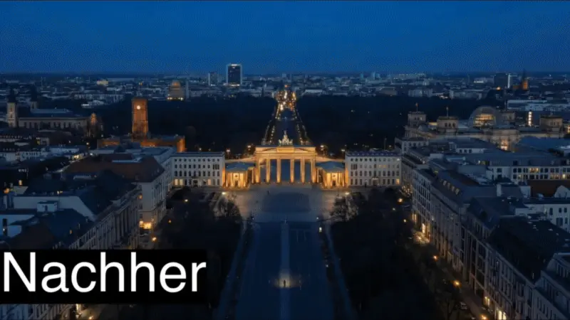 Nachher: Teamfoto in modernem Showroom mit Präsentationswänden. KI-Video basierend auf einem Bild.