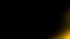 Ein weicher, orangefarbener Lichtschein in der unteren rechten Ecke auf einem ansonsten komplett schwarzen Hintergrund.