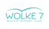 Türkises Logo Wolke 7 Beach Club Restaurant Lounge mit geschwungener Wellenlinie auf schwarzem Hintergrund.