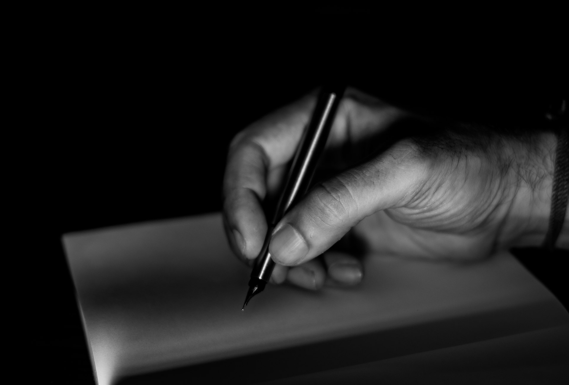 A national pastor teaching from an open Bible